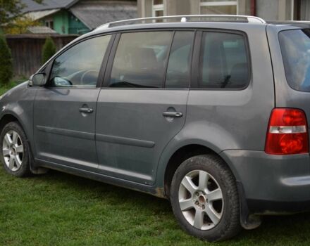 Серый Фольксваген Туран, объемом двигателя 2 л и пробегом 370 тыс. км за 4950 $, фото 4 на Automoto.ua