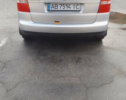 Серый Фольксваген Туран, объемом двигателя 1.6 л и пробегом 225 тыс. км за 5999 $, фото 2 на Automoto.ua