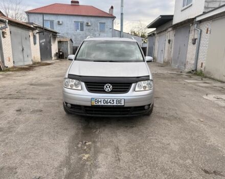 Серый Фольксваген Туран, объемом двигателя 1.6 л и пробегом 261 тыс. км за 5000 $, фото 1 на Automoto.ua