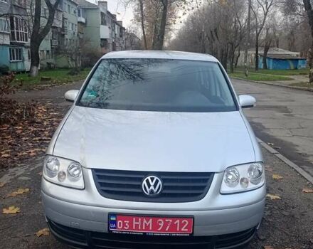 Серый Фольксваген Туран, объемом двигателя 1.6 л и пробегом 230 тыс. км за 5995 $, фото 2 на Automoto.ua