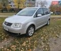 Серый Фольксваген Туран, объемом двигателя 1.6 л и пробегом 280 тыс. км за 5250 $, фото 1 на Automoto.ua