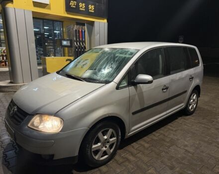 Серый Фольксваген Туран, объемом двигателя 2 л и пробегом 180 тыс. км за 2000 $, фото 1 на Automoto.ua