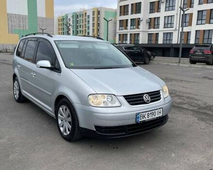 Серый Фольксваген Туран, объемом двигателя 2 л и пробегом 296 тыс. км за 4999 $, фото 1 на Automoto.ua