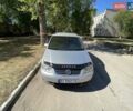 Серый Фольксваген Туран, объемом двигателя 2 л и пробегом 450 тыс. км за 4100 $, фото 1 на Automoto.ua