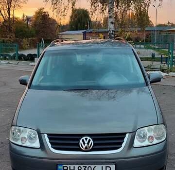 Серый Фольксваген Туран, объемом двигателя 1.9 л и пробегом 254 тыс. км за 5950 $, фото 4 на Automoto.ua
