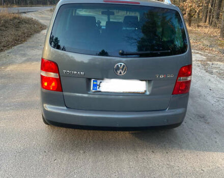 Серый Фольксваген Туран, объемом двигателя 2 л и пробегом 280 тыс. км за 5500 $, фото 3 на Automoto.ua