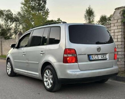 Сірий Фольксваген Туран, об'ємом двигуна 2 л та пробігом 250 тис. км за 3516 $, фото 1 на Automoto.ua