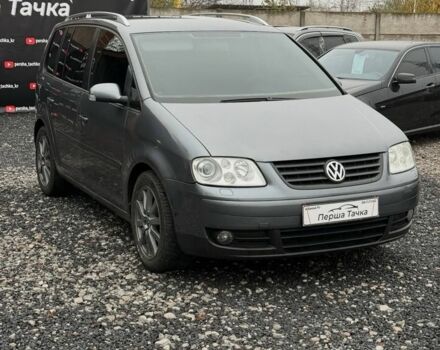 Серый Фольксваген Туран, объемом двигателя 2 л и пробегом 300 тыс. км за 7500 $, фото 2 на Automoto.ua