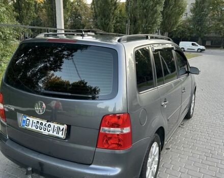 Серый Фольксваген Туран, объемом двигателя 2 л и пробегом 280 тыс. км за 6000 $, фото 1 на Automoto.ua