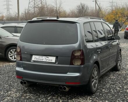 Серый Фольксваген Туран, объемом двигателя 2 л и пробегом 300 тыс. км за 7500 $, фото 3 на Automoto.ua