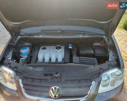 Серый Фольксваген Туран, объемом двигателя 1.9 л и пробегом 189 тыс. км за 7300 $, фото 1 на Automoto.ua