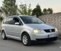 Сірий Фольксваген Туран, об'ємом двигуна 2 л та пробігом 250 тис. км за 3516 $, фото 2 на Automoto.ua