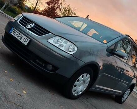 Серый Фольксваген Туран, объемом двигателя 1.9 л и пробегом 254 тыс. км за 5950 $, фото 2 на Automoto.ua