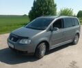 Сірий Фольксваген Туран, об'ємом двигуна 2 л та пробігом 320 тис. км за 5408 $, фото 1 на Automoto.ua