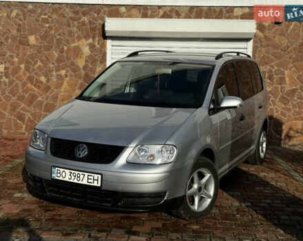 Серый Фольксваген Туран, объемом двигателя 1.9 л и пробегом 205 тыс. км за 5600 $, фото 1 на Automoto.ua