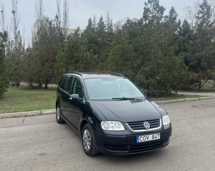 Серый Фольксваген Туран, объемом двигателя 2 л и пробегом 250 тыс. км за 3550 $, фото 3 на Automoto.ua