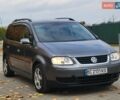 Серый Фольксваген Туран, объемом двигателя 2 л и пробегом 330 тыс. км за 5300 $, фото 2 на Automoto.ua