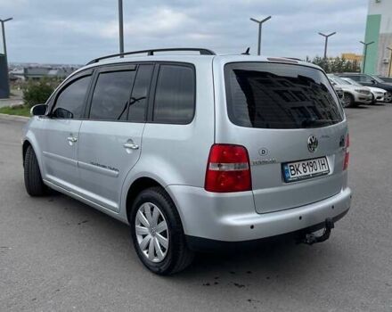 Серый Фольксваген Туран, объемом двигателя 2 л и пробегом 296 тыс. км за 4999 $, фото 3 на Automoto.ua