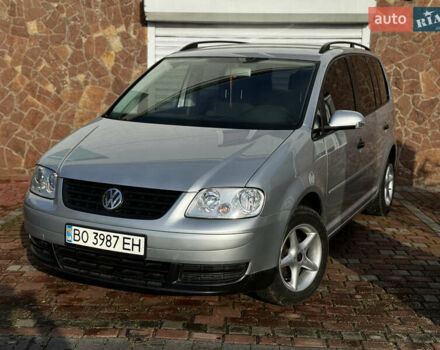 Серый Фольксваген Туран, объемом двигателя 1.9 л и пробегом 205 тыс. км за 5600 $, фото 7 на Automoto.ua