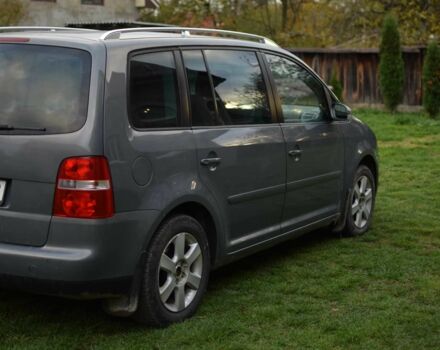 Серый Фольксваген Туран, объемом двигателя 2 л и пробегом 370 тыс. км за 4950 $, фото 3 на Automoto.ua