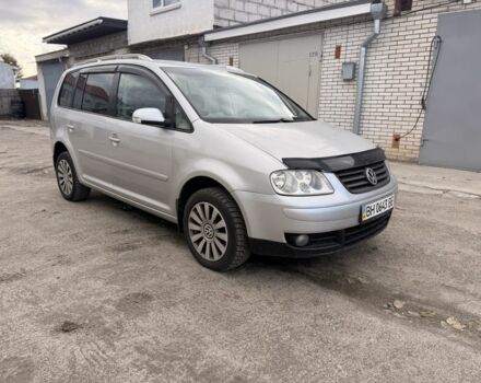 Серый Фольксваген Туран, объемом двигателя 1.6 л и пробегом 261 тыс. км за 5000 $, фото 2 на Automoto.ua