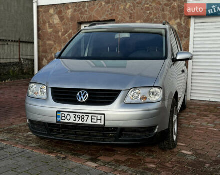 Серый Фольксваген Туран, объемом двигателя 1.9 л и пробегом 205 тыс. км за 5600 $, фото 5 на Automoto.ua