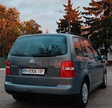 Серый Фольксваген Туран, объемом двигателя 1.9 л и пробегом 254 тыс. км за 5950 $, фото 9 на Automoto.ua