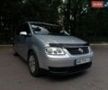 Серый Фольксваген Туран, объемом двигателя 1.6 л и пробегом 240 тыс. км за 5999 $, фото 1 на Automoto.ua