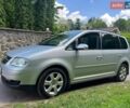 Серый Фольксваген Туран, объемом двигателя 1.6 л и пробегом 235 тыс. км за 5500 $, фото 1 на Automoto.ua