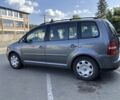 Сірий Фольксваген Туран, об'ємом двигуна 1.6 л та пробігом 180 тис. км за 5200 $, фото 3 на Automoto.ua