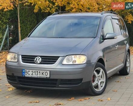 Серый Фольксваген Туран, объемом двигателя 2 л и пробегом 330 тыс. км за 5300 $, фото 1 на Automoto.ua