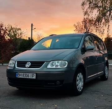 Серый Фольксваген Туран, объемом двигателя 1.9 л и пробегом 254 тыс. км за 5950 $, фото 1 на Automoto.ua