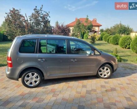 Серый Фольксваген Туран, объемом двигателя 1.9 л и пробегом 189 тыс. км за 7300 $, фото 3 на Automoto.ua