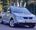 Серый Фольксваген Туран, объемом двигателя 1.6 л и пробегом 241 тыс. км за 5800 $, фото 1 на Automoto.ua