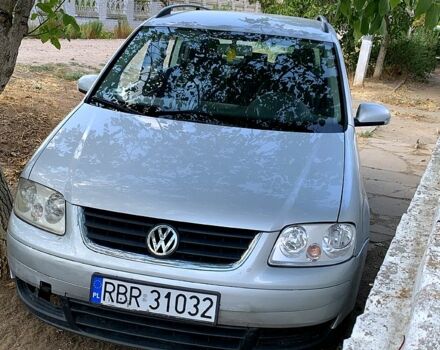 Серый Фольксваген Туран, объемом двигателя 1.9 л и пробегом 309 тыс. км за 2350 $, фото 1 на Automoto.ua