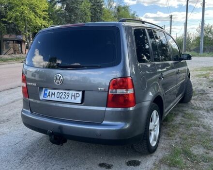 Серый Фольксваген Туран, объемом двигателя 1.4 л и пробегом 240 тыс. км за 5300 $, фото 2 на Automoto.ua