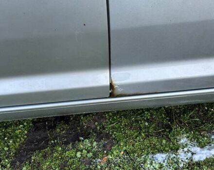 Серый Фольксваген Туран, объемом двигателя 1.9 л и пробегом 233 тыс. км за 6300 $, фото 31 на Automoto.ua