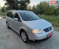 Сірий Фольксваген Туран, об'ємом двигуна 1.6 л та пробігом 246 тис. км за 6100 $, фото 2 на Automoto.ua