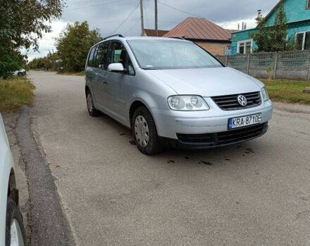 Серый Фольксваген Туран, объемом двигателя 1.9 л и пробегом 430 тыс. км за 2450 $, фото 1 на Automoto.ua