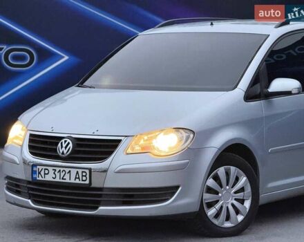 Серый Фольксваген Туран, объемом двигателя 1.39 л и пробегом 211 тыс. км за 6799 $, фото 1 на Automoto.ua