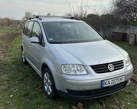 Серый Фольксваген Туран, объемом двигателя 1.9 л и пробегом 233 тыс. км за 6300 $, фото 1 на Automoto.ua