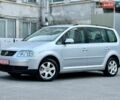 Сірий Фольксваген Туран, об'ємом двигуна 1.6 л та пробігом 229 тис. км за 7799 $, фото 1 на Automoto.ua
