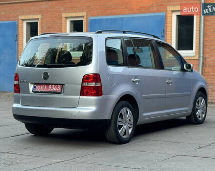 Серый Фольксваген Туран, объемом двигателя 1.6 л и пробегом 219 тыс. км за 6599 $, фото 3 на Automoto.ua