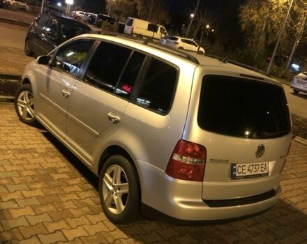 Серый Фольксваген Туран, объемом двигателя 2 л и пробегом 260 тыс. км за 7599 $, фото 1 на Automoto.ua