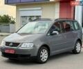 Серый Фольксваген Туран, объемом двигателя 1.6 л и пробегом 179 тыс. км за 6200 $, фото 1 на Automoto.ua