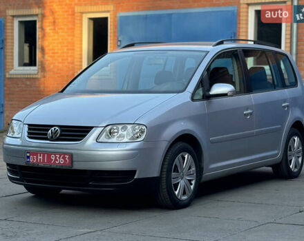 Серый Фольксваген Туран, объемом двигателя 1.6 л и пробегом 219 тыс. км за 6599 $, фото 1 на Automoto.ua