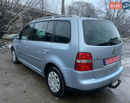 Серый Фольксваген Туран, объемом двигателя 2 л и пробегом 202 тыс. км за 5800 $, фото 2 на Automoto.ua