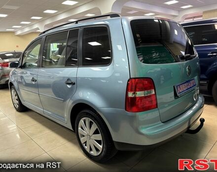 Серый Фольксваген Туран, объемом двигателя 1.6 л и пробегом 213 тыс. км за 6600 $, фото 1 на Automoto.ua