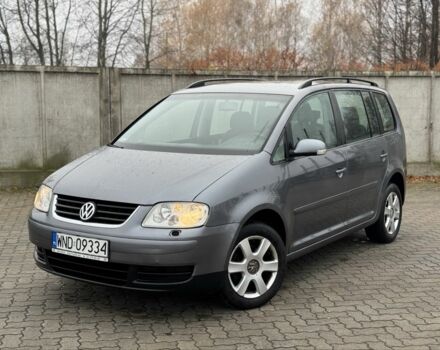 Серый Фольксваген Туран, объемом двигателя 2 л и пробегом 370 тыс. км за 2550 $, фото 2 на Automoto.ua