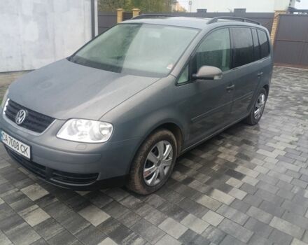 Серый Фольксваген Туран, объемом двигателя 1.6 л и пробегом 280 тыс. км за 5400 $, фото 2 на Automoto.ua